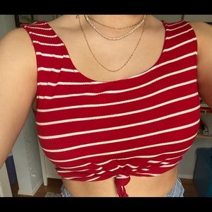red/white striped shirt, slight ruffle at bottom
